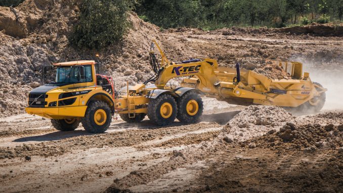 mini excavator on hill