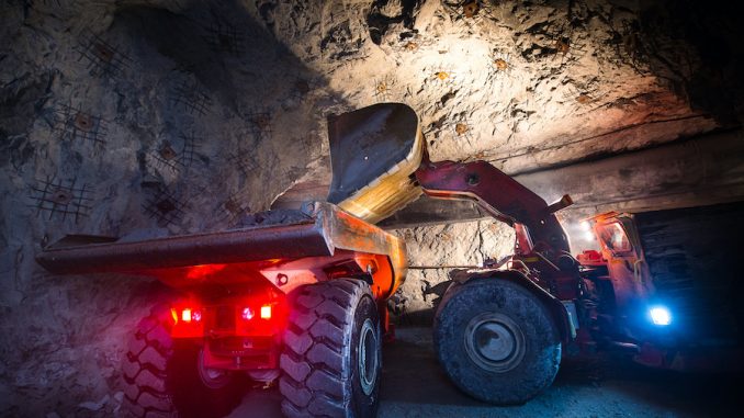 underground-mine-reclamation low boy trailer loading