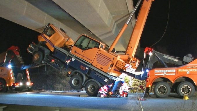 Holleben, Germany. 26th Feb, 2019. A truck-mounted crane with its boom extended drove against a motorway bridge near the Holleben motorway junction. The driver was seriously injured in the accident. (Best possible quality) Credit: TNN/dpa/Alamy Live News volumetric mixer that retains value