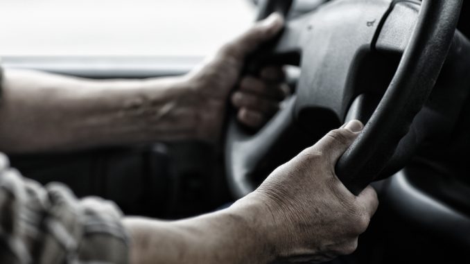 Male,Driver,Hands,Holding,Steering,Wheel.